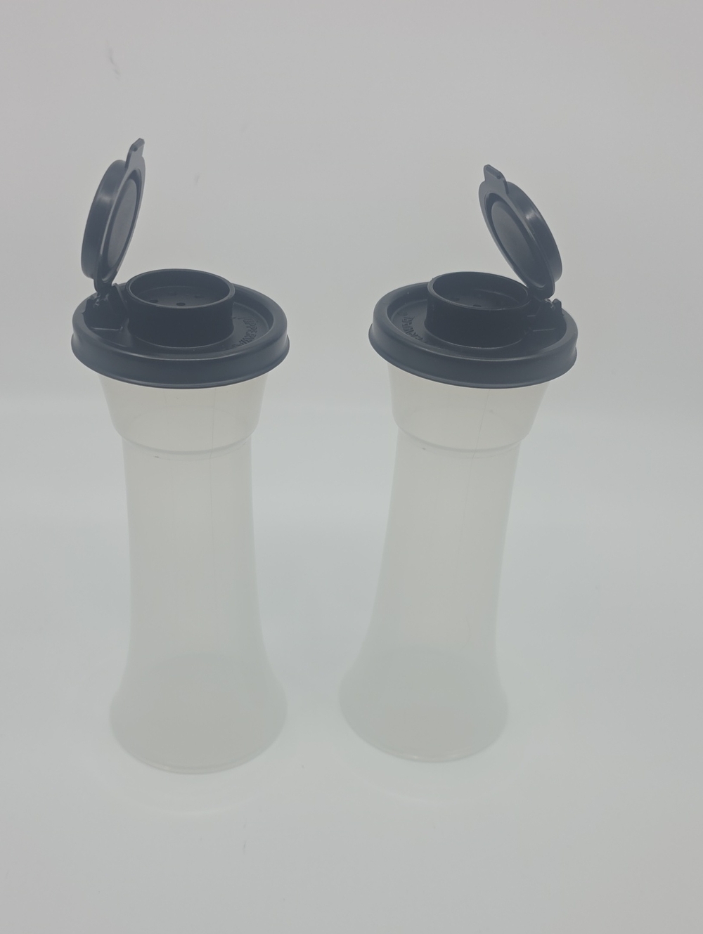 Tupperware Large Hourglass Salt and Pepper Shakers Set In Exclusif  Black  New